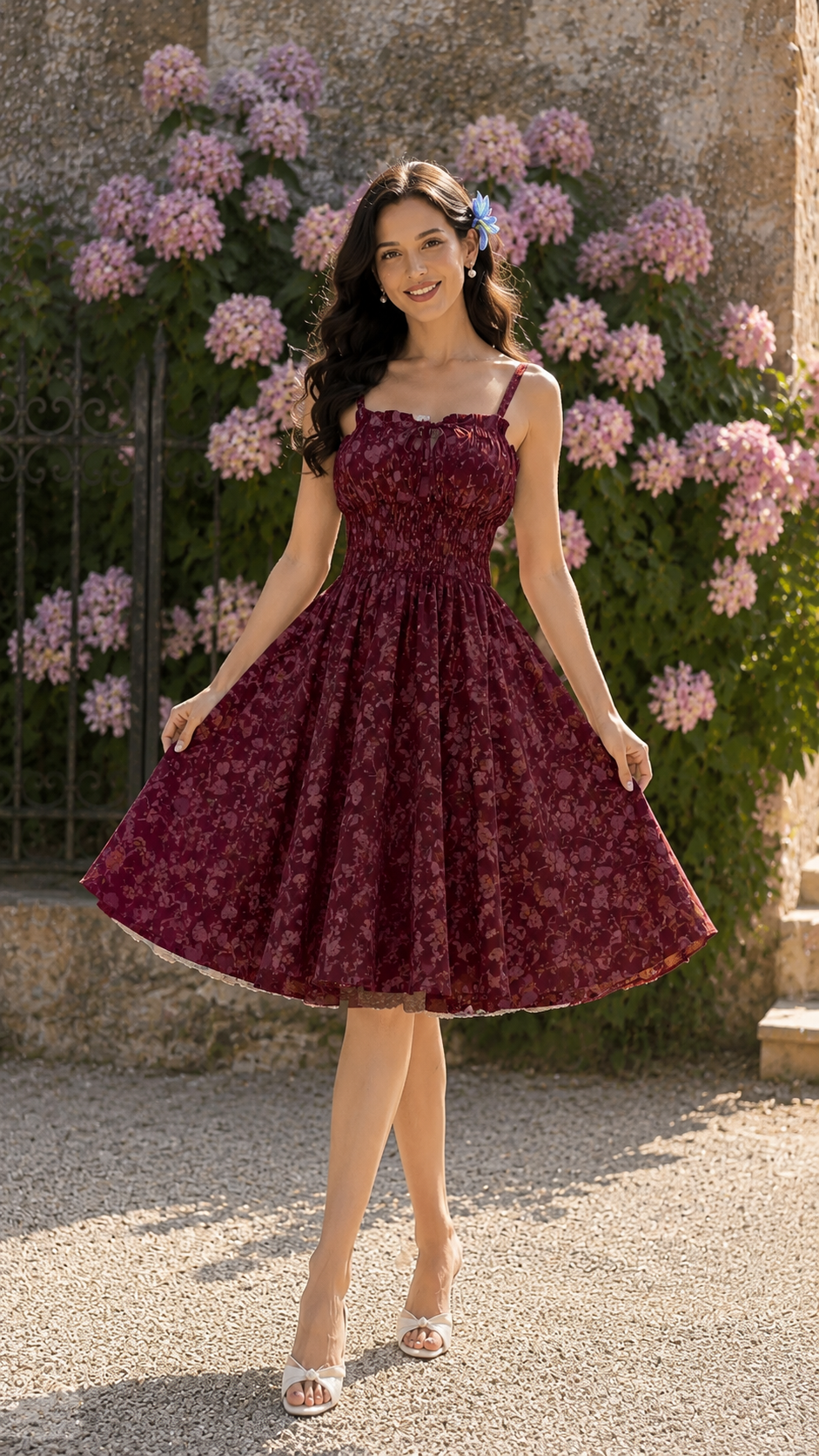 Front view of burgundy floral smocked midi sundress with slim shoulder straps