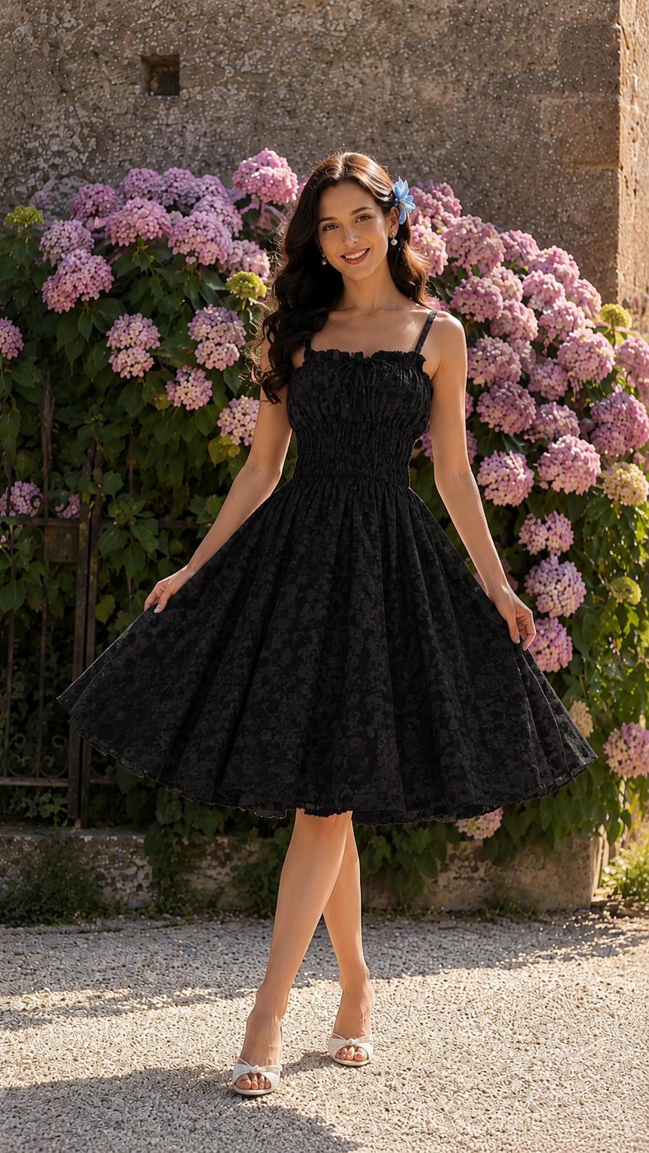 Front view of black floral-textured smocked midi sundress with full skirt